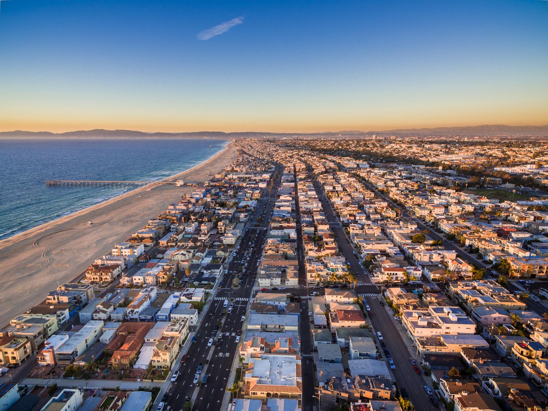 Ocean, beach and Hermosa Beach panorama looking toward Santa Monica mountains